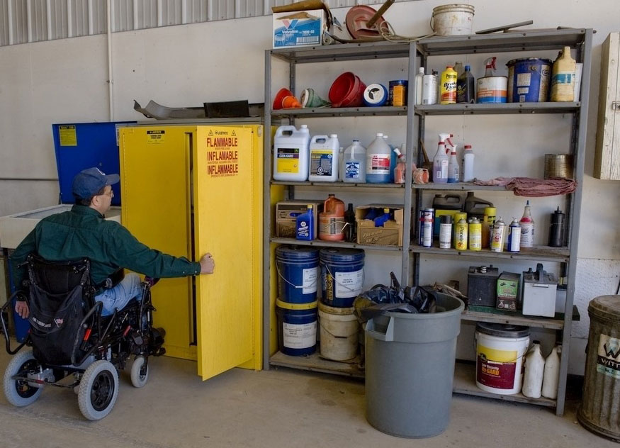 Man looking at hazardous supplies.