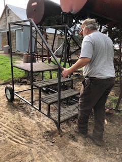 Wendell working on the farm.